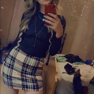 Black crop top with the plaid skirt